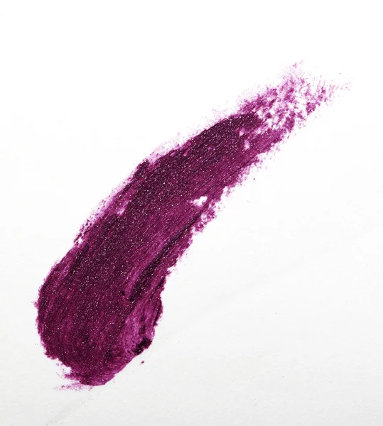 Purple color lipstick stroke on white paper — Stock Photo, Image