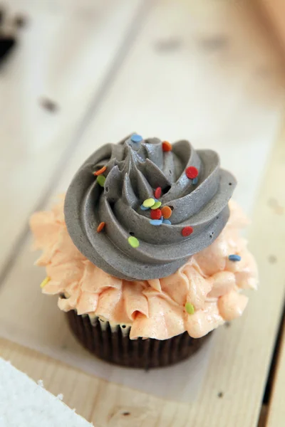 Decorated cupcake on table — Stock Photo, Image