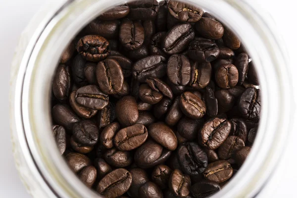 Färska kaffebönor i flaska — Stockfoto