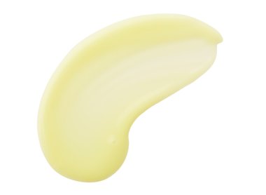 Arka plan sarı renkli kozmetik krem teslimi