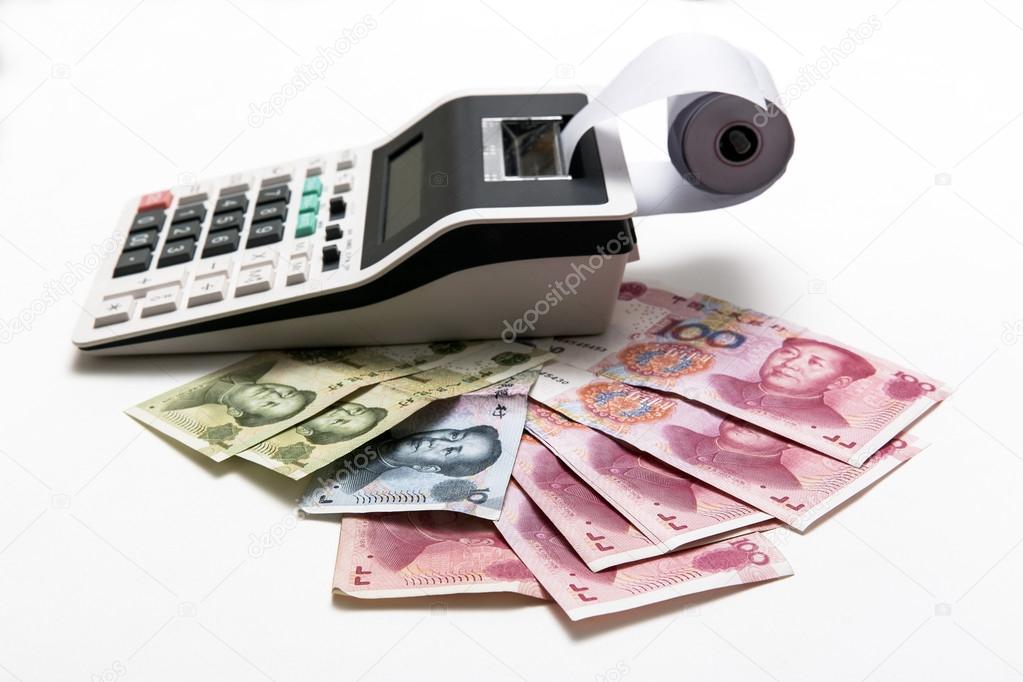 China money bills and calculator on background