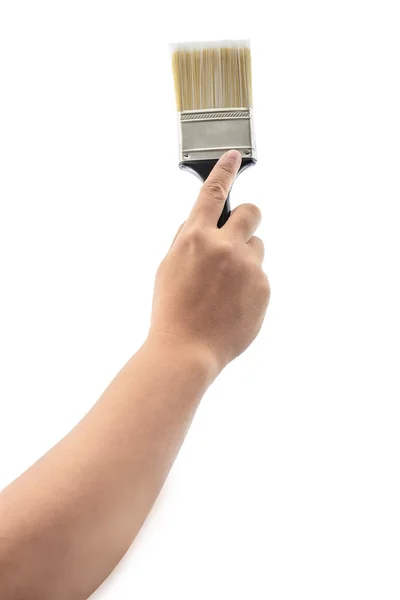 Hand holding paint brush with plastic black handle isolated — Stock Photo, Image