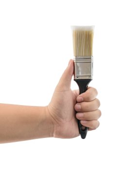 plastik siyah saplı izole boya fırçası tutan el