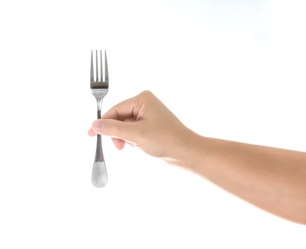 Mano sosteniendo un tenedor de plata aislado en blanco — Foto de Stock