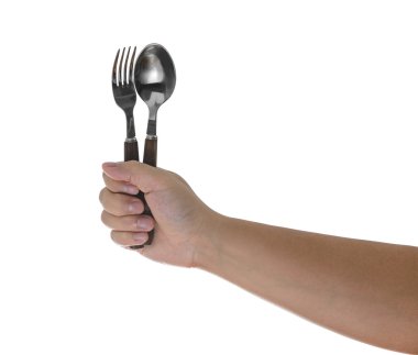 Çatal ve kaşık izole bir adamın elleri tarafından düzenlenen