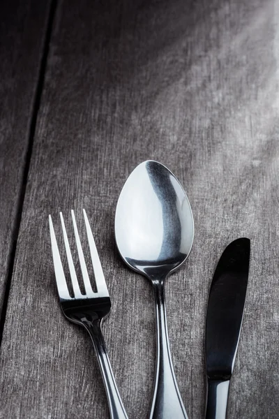 Vintage silverware on rustic wooden background — Stock Photo, Image