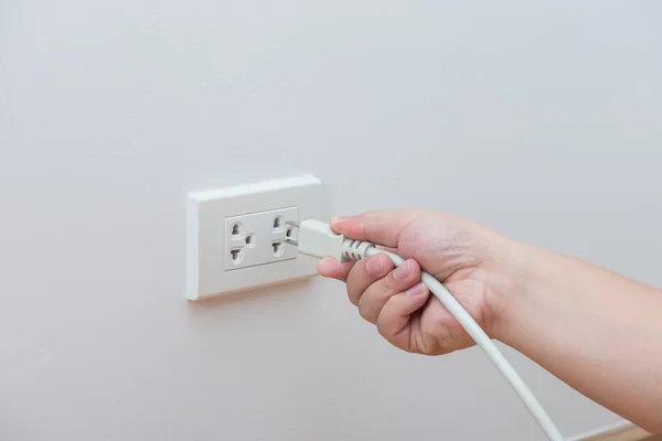 Unplug or plugged in concept Royalty Free Stock Photos