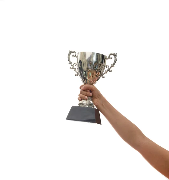 Şampiyon bir gümüş kupa beyaz arka plan üzerinde tutan kadın — Stok fotoğraf