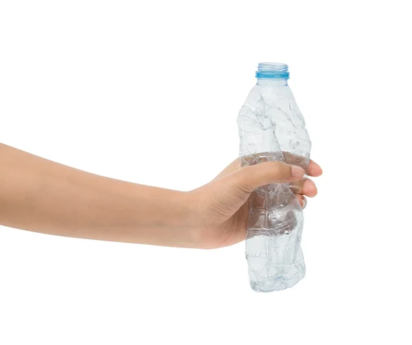 Lege plastic fles in vrouw hand verpletterd — Stockfoto