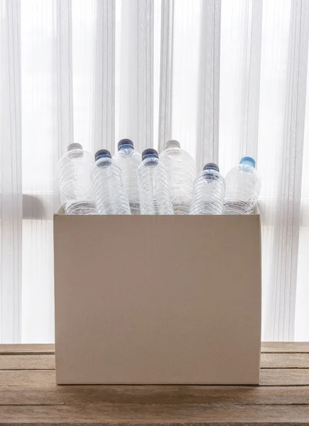 Recycling box filled with clear plastic containers — Stock Photo, Image