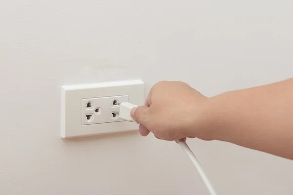 Unplug or plugged in concept Stock Image