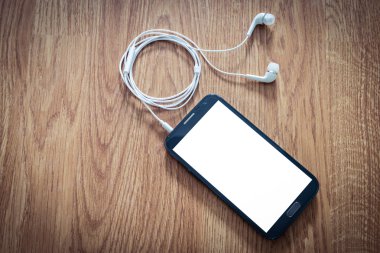 Smartphone için bağlı beyaz kulaklık