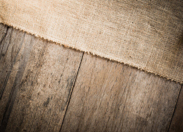 Burlap and wooden texture background