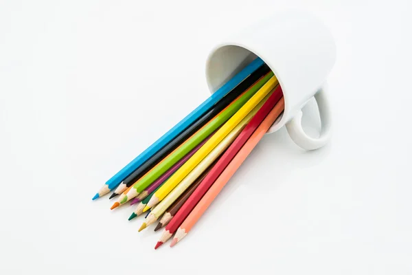 Montón de lápices de colores sobre fondo blanco — Foto de Stock