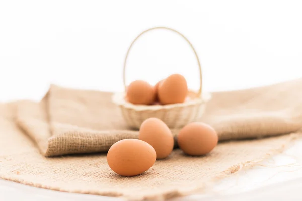 Chicken eggs in the bamboo basket — Stock Photo, Image