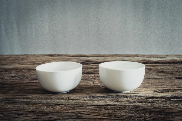 Empty little bowl on wooden tabletop — Stock Photo, Image