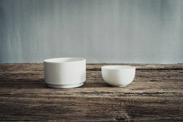 Empty little bowl on wooden tabletop — Stock Photo, Image