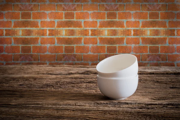 Empty little bowl on wooden tabletop — Stock Photo, Image