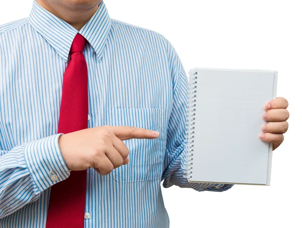 Empresario sosteniendo y señalando el cuaderno. Aislado sobre blanco — Foto de Stock