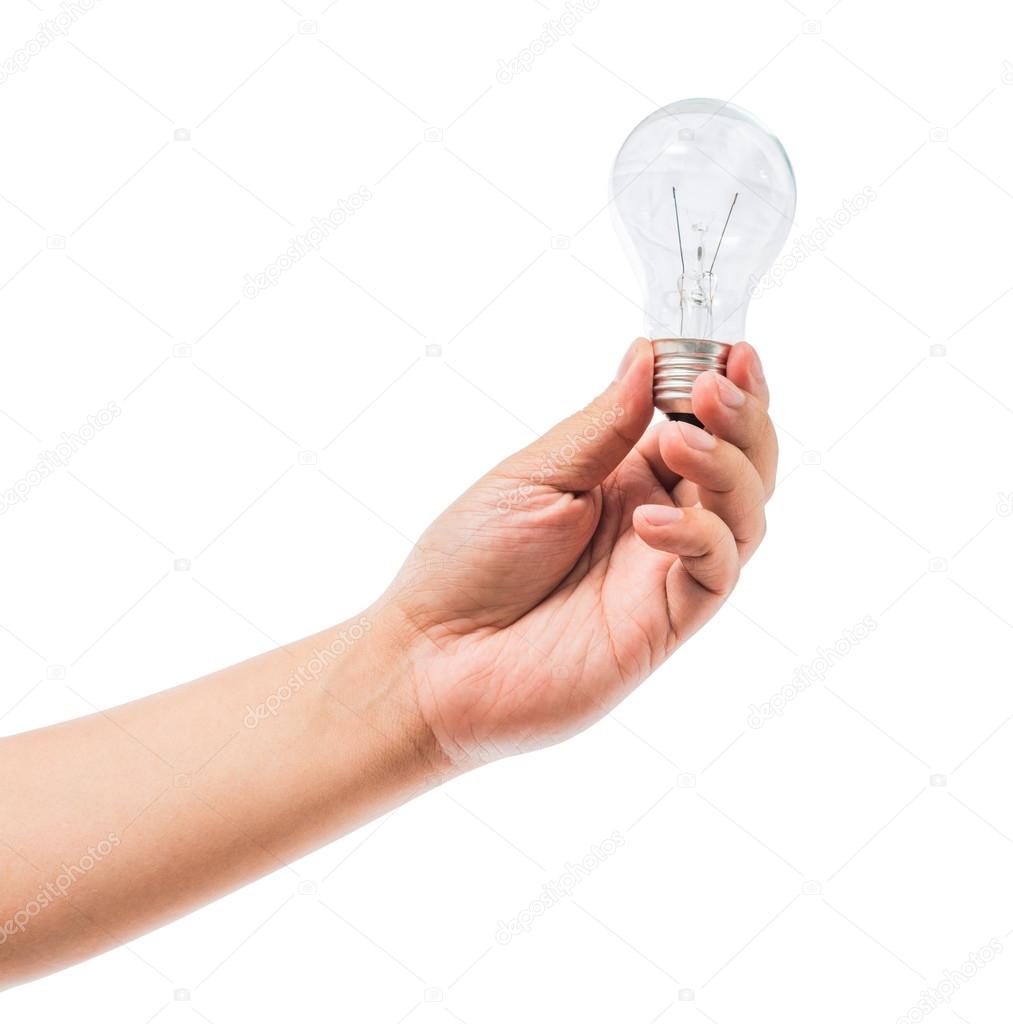 Hand holding an incandescent light bulb isolated on white backgr
