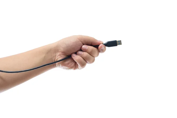 Mão segurando cabo USB isolado no fundo branco — Fotografia de Stock