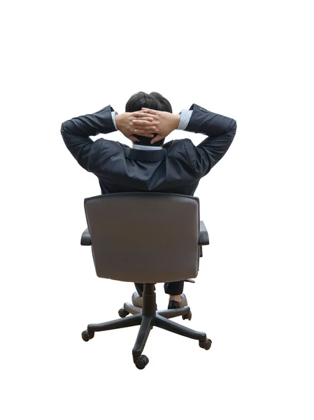 Relaxed and dreaming business man sits on office chair — Stock Photo, Image