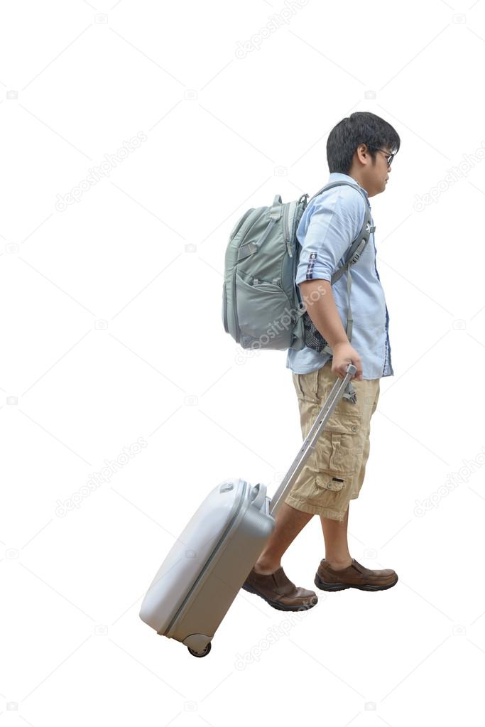 portrait of a man traveling with suitcase and bag