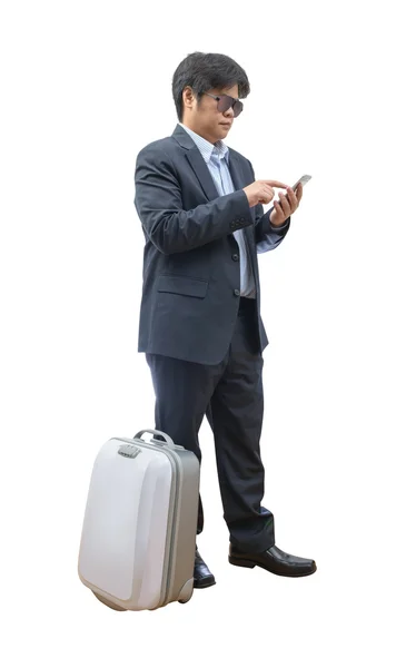 Hombre de negocios usando el teléfono con el equipaje —  Fotos de Stock