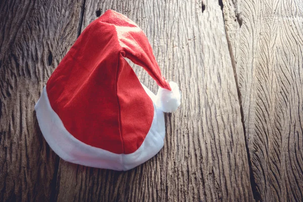 Santa hat on wooden — Stock Photo, Image