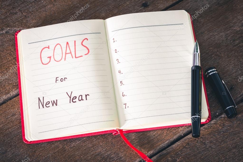 New Year's goals with notebook and pen