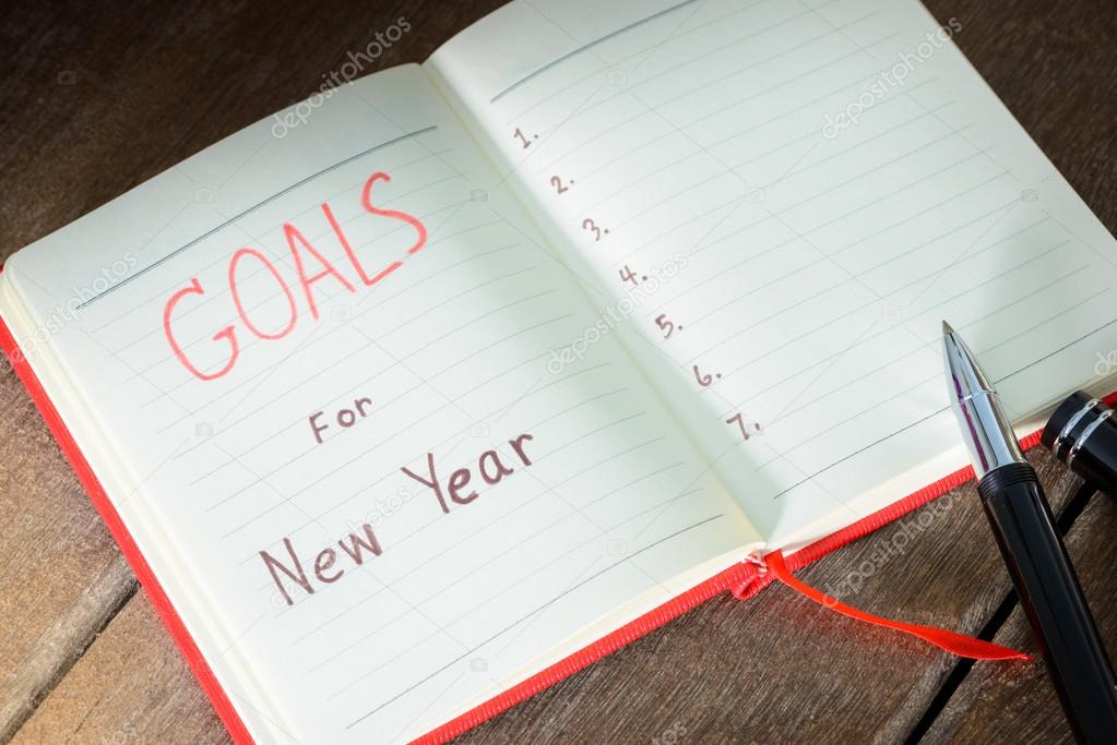 New Year's goals with notebook and pen
