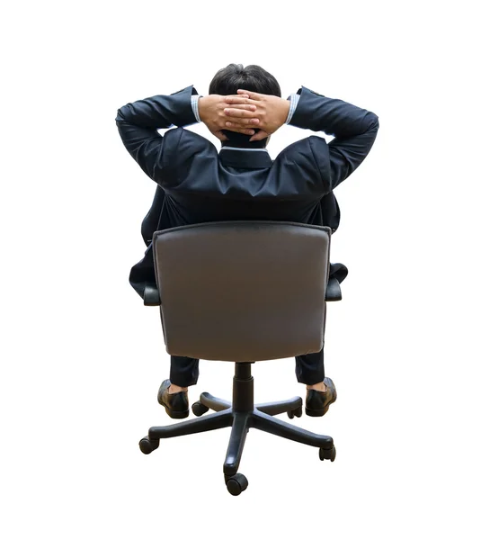 Relaxado e sonhando homem de negócios senta-se na cadeira de escritório — Fotografia de Stock