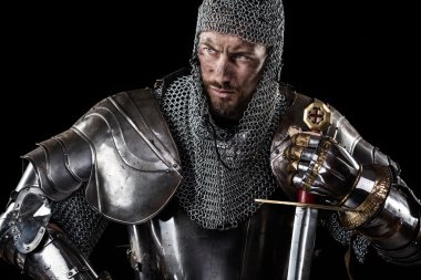 Medieval Warrior with chain mail armour and sword clipart
