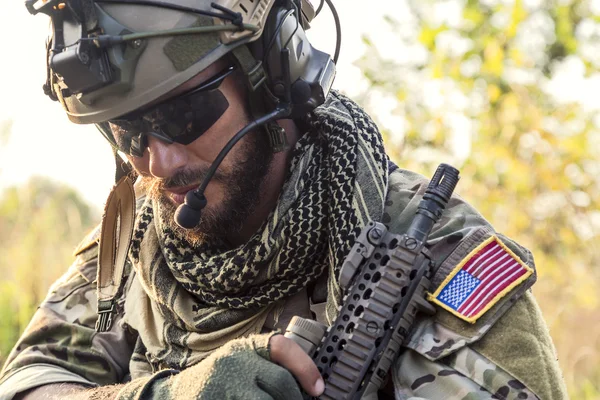 American Soldier looking down