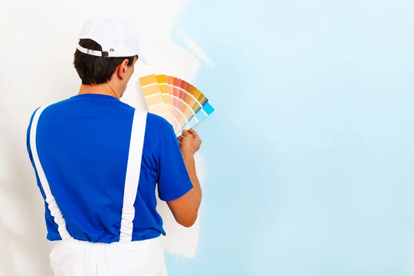 Painter man looking a color palette Stock Photo