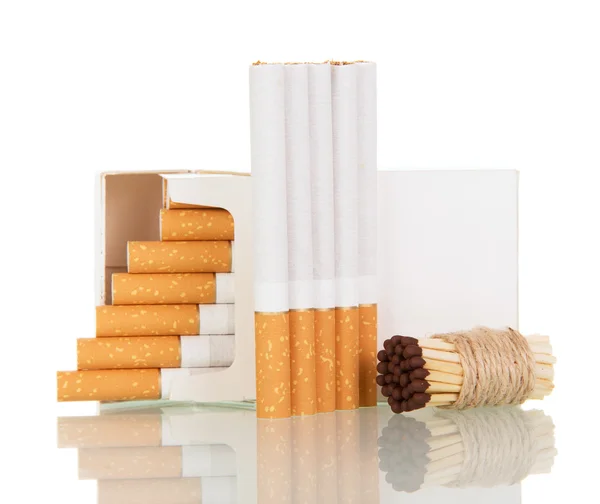 Open pack cigarettes and bunch of matches close up isolated on white — Stock Photo, Image