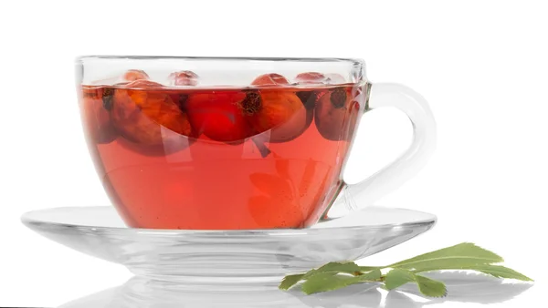 Transparent cup with tea and rose hips isolated on white — Stock Photo, Image