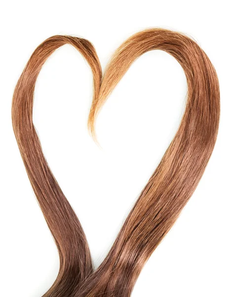 Corazón de hebras de pelo liso aislado en un blanco —  Fotos de Stock