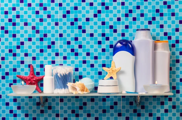 Hygiene products on  shelf in the bathroom