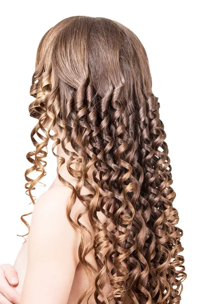 Menina com cabelo bonito, longo e ondulado isolado no branco — Fotografia de Stock