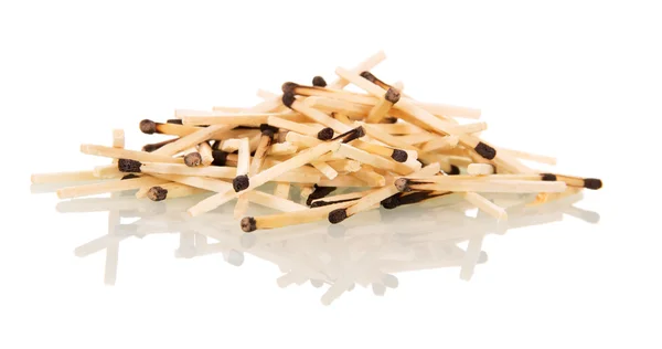 Handful of charred matchsticks isolated on white — Stock Photo, Image