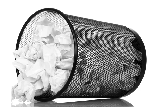 Frustrate office basket dropping out o her crumpled paper isolated on white background. — Stock Photo, Image