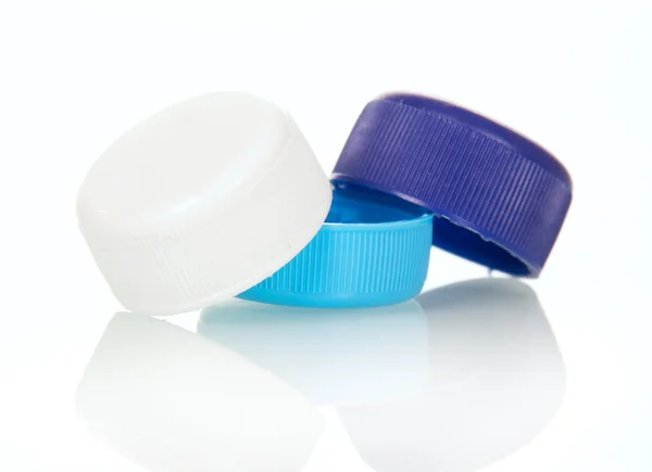 Multi-gekleurde cover met plastic flessen geïsoleerd op wit. — Stockfoto