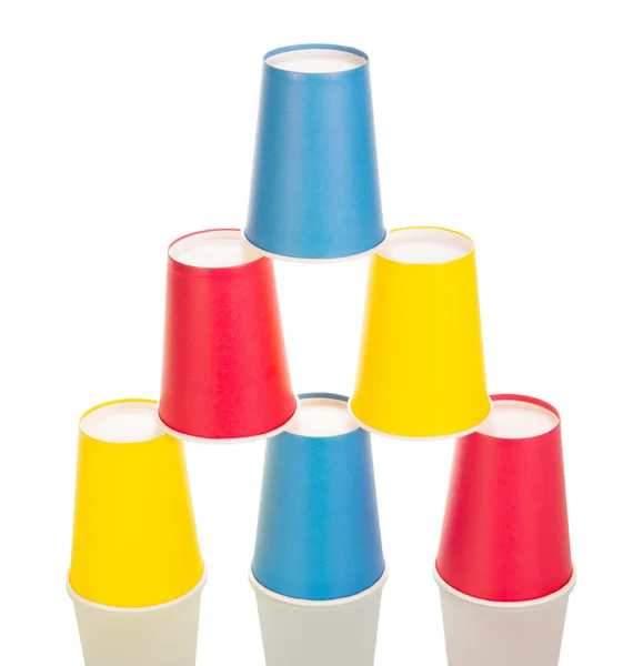 Pyramid from multi-colored disposable cups isolated on white — Stock Photo, Image