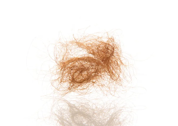 Pile of tangled hair close-up isolated on white background. — Stock Photo, Image