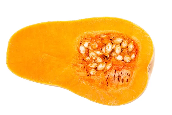 Metade de abóbora laranja com sementes isoladas em branco . — Fotografia de Stock