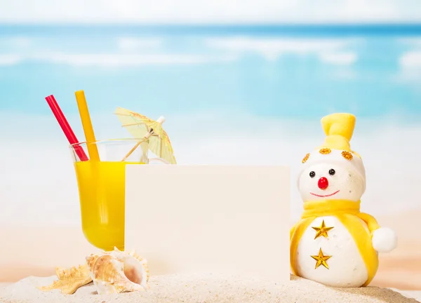 Blank card, cocktail, snowman, sea shells and  star in sand . — Stock Photo, Image