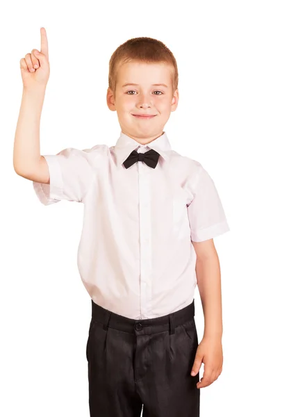 Carino ragazzo in scuola uniforme mostra pollice fino isolato . — Foto Stock