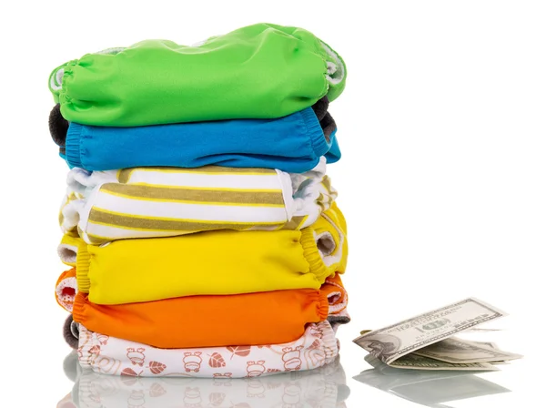 Modern eco-friendly diapers and money isolated on white. — Stock Photo, Image