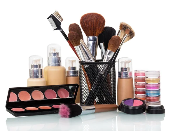 Beauty, brush, eye shadow, liquid foundation and lip gloss isolated. — Stock Photo, Image